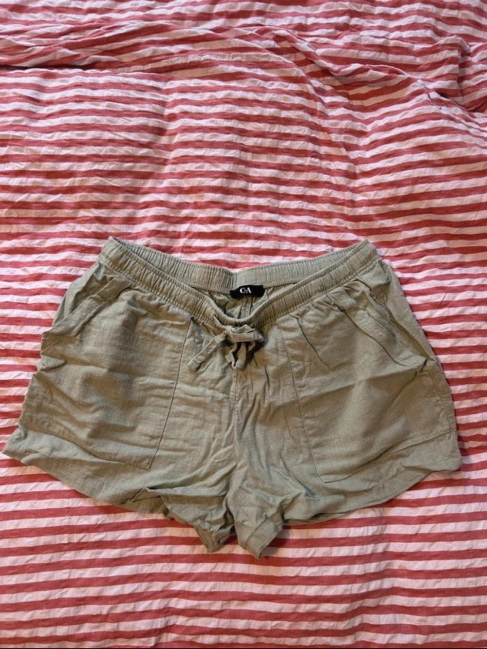 Green linen shorts
